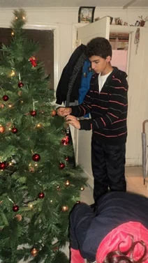 CIS college student initiative with a BASSMA family