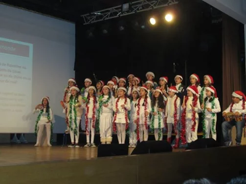 College Protestant singing Christmas Joy for BASSMA's children