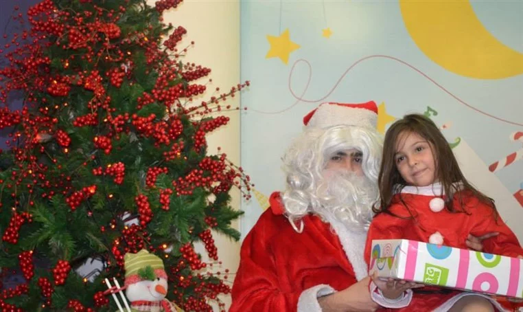 Christmas Gifts Distribution 2014 at Planet Discovery