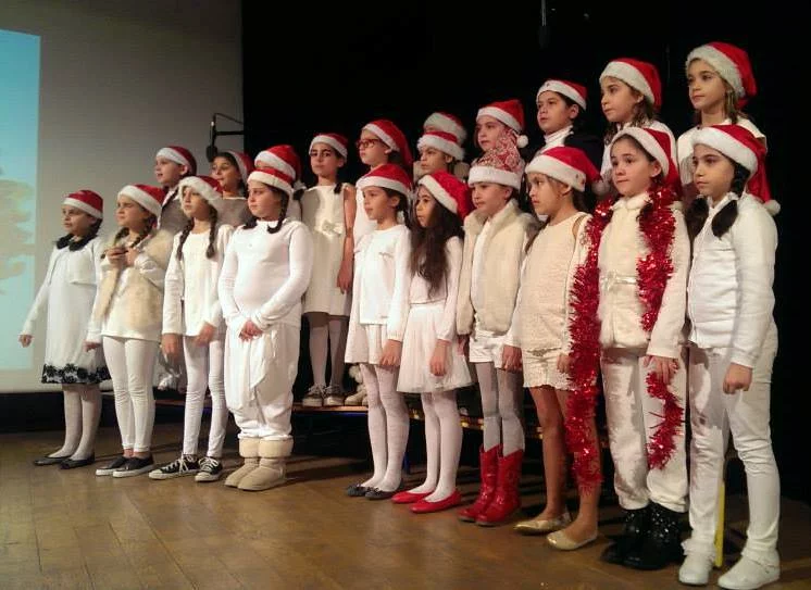 College Protestant singing Christmas Joy for BASSMA's children