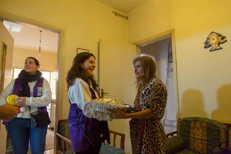 Distribution of Cooked Turkeys & Financial Donation 